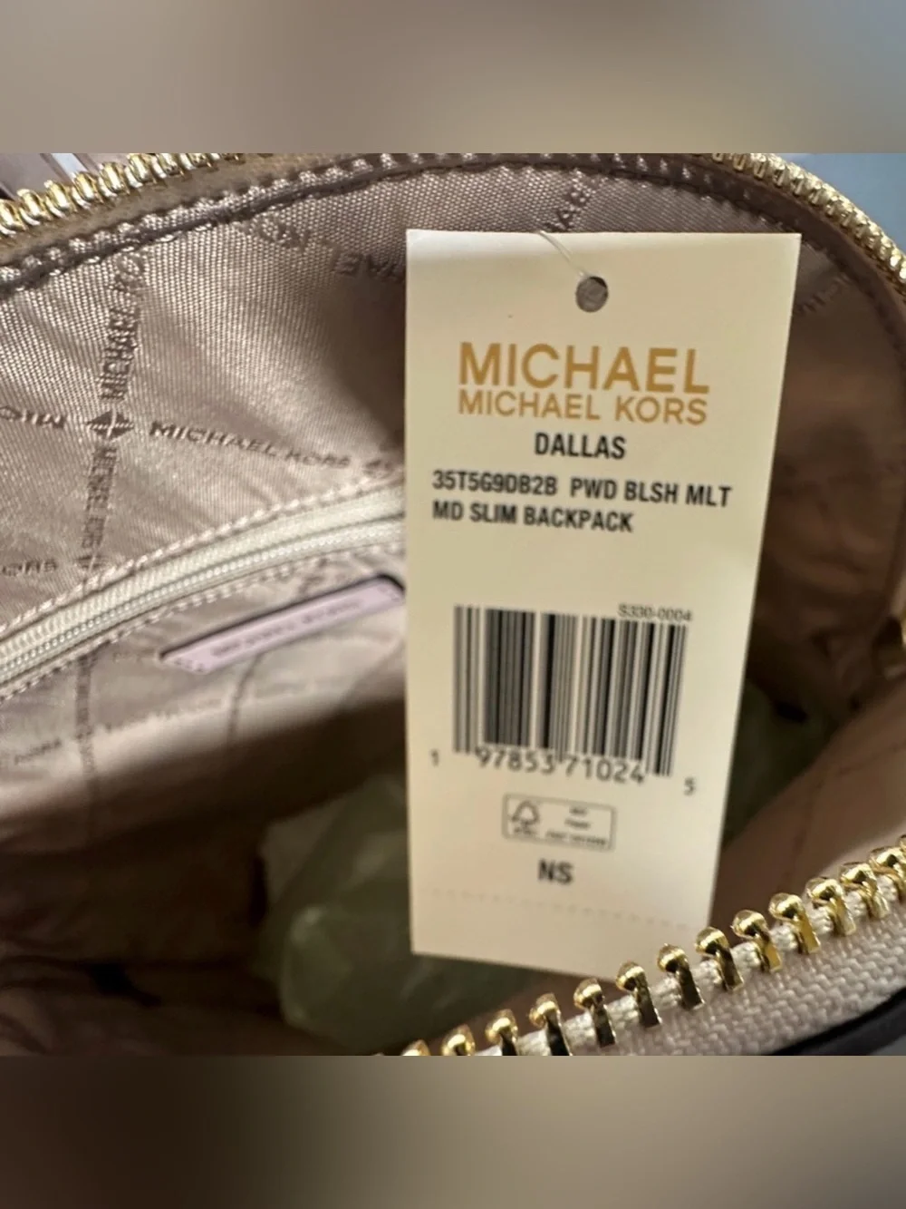 Michael Kors backpack logo